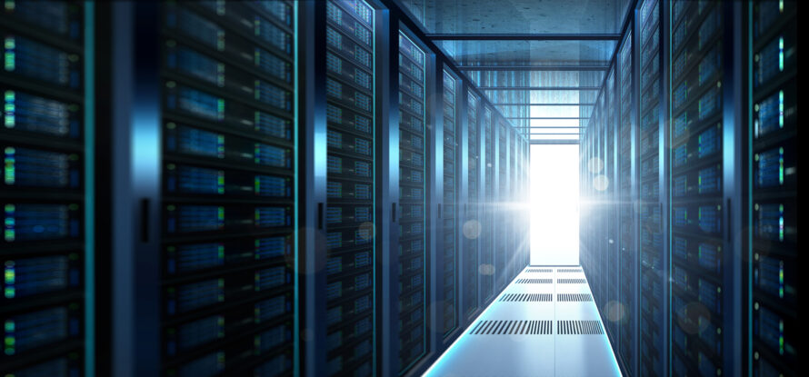 A dark corridor with faint lights glowing from devices on the walls leads to an open doorway glowing bright white.